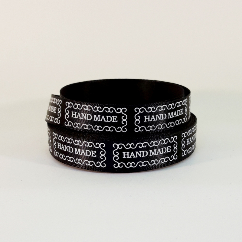 Лента атласная с рисунком "Hand made" шир.15мм цв.чёрный 1м/.22,86 м